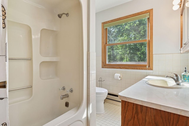 16059 Kettle River Blvd NE, Columbus, MN 55025 - bathroom featuring tile walls, tile patterned flooring, vanity, shower / tub combo, and baseboard heating