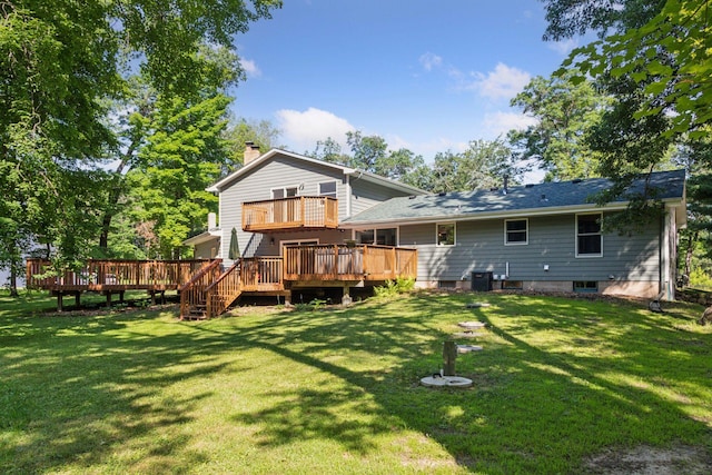 16059 Kettle River Blvd NE, Columbus, MN 55025 - back of property featuring a chimney, a wooden deck, a lawn, and a balcony