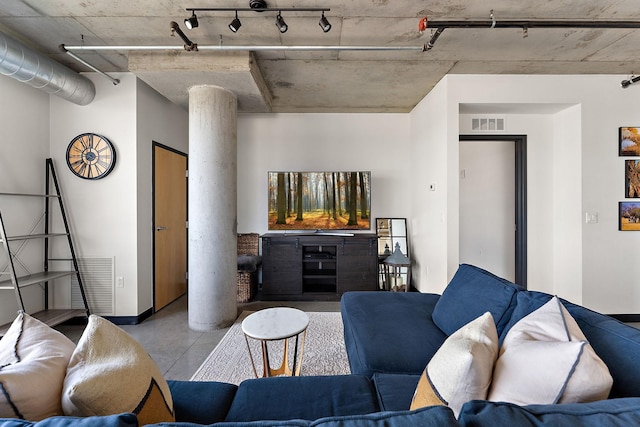 730 4th St Unit 601, Minneapolis, MN 55401 - living area featuring rail lighting and concrete flooring