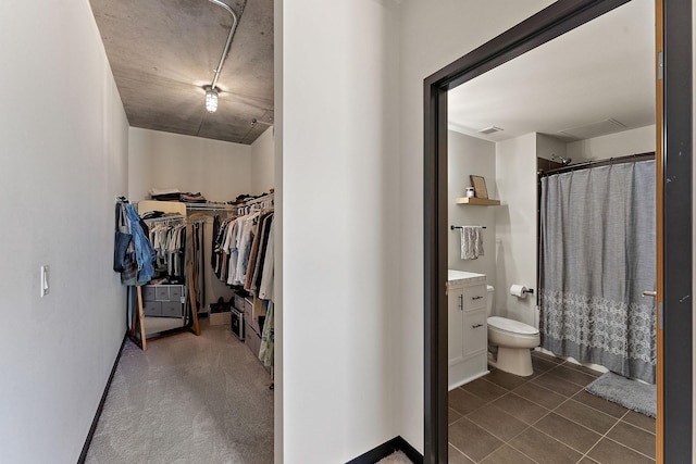 730 4th St Unit 601, Minneapolis, MN 55401 - spacious closet with dark tile patterned flooring