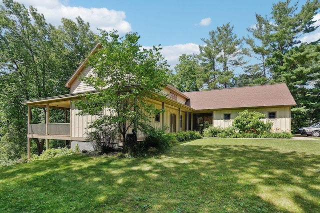 31338 Oasis Rd, Center City, MN 55012 - view of front of home featuring a front lawn and board and batten siding