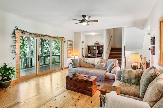31338 Oasis Rd, Center City, MN 55012 - living room with stairway, wood finished floors, and a ceiling fan