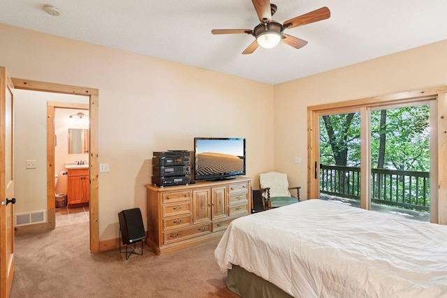 31338 Oasis Rd, Center City, MN 55012 - bedroom with access to exterior, light carpet, and a ceiling fan