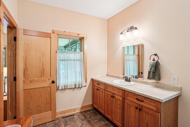 31338 Oasis Rd, Center City, MN 55012 - bathroom featuring vanity and baseboards