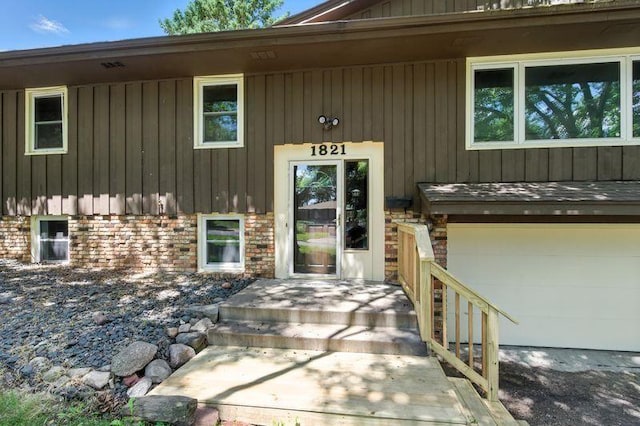 1821 Wilson Ave, Saint Paul, MN 55106 - entrance to property featuring a garage