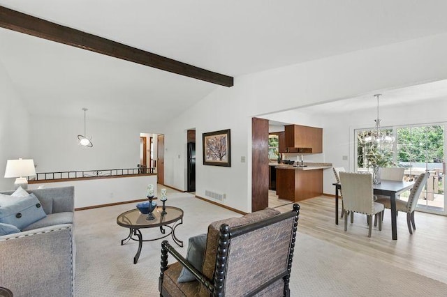 1821 Wilson Ave, Saint Paul, MN 55106 - living area with a chandelier and light wood finished floors