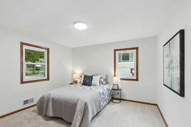 1821 Wilson Ave, Saint Paul, MN 55106 - bedroom featuring light colored carpet