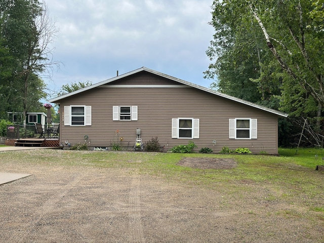406 State 6 S, Remer, MN 56672 - view of property exterior featuring a wooden deck