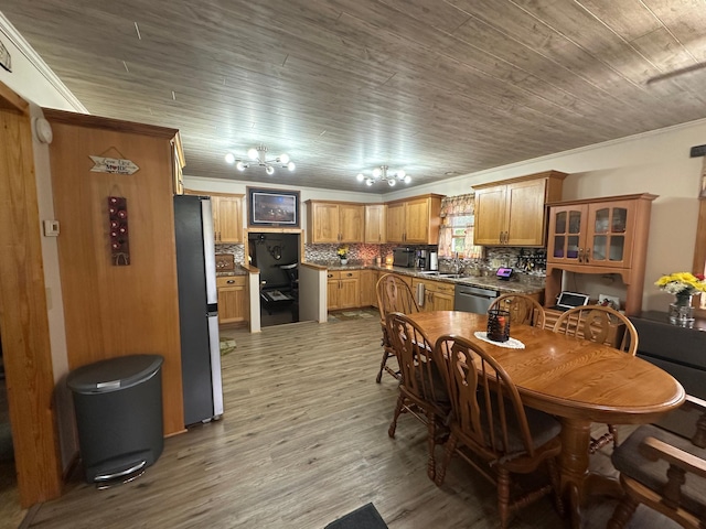 406 State 6 S, Remer, MN 56672 - dining area with wood finished floors, wood ceiling, crown molding, and a chandelier