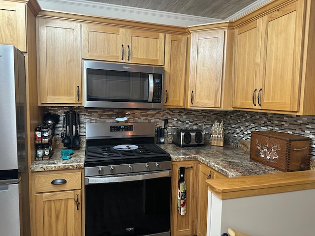 406 State 6 S, Remer, MN 56672 - kitchen with appliances with stainless steel finishes, backsplash, and crown molding