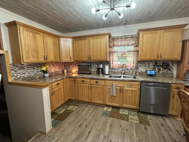 406 State 6 S, Remer, MN 56672 - kitchen with stainless steel dishwasher, crown molding, a chandelier, light wood-style floors, and backsplash