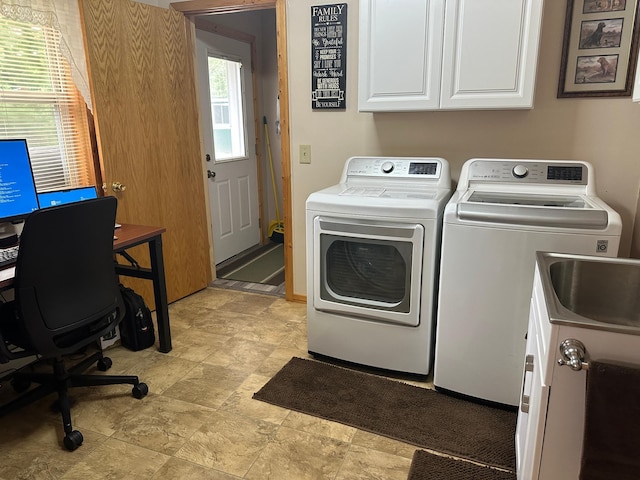 406 State 6 S, Remer, MN 56672 - laundry room with cabinet space, washer and dryer, and stone finish flooring