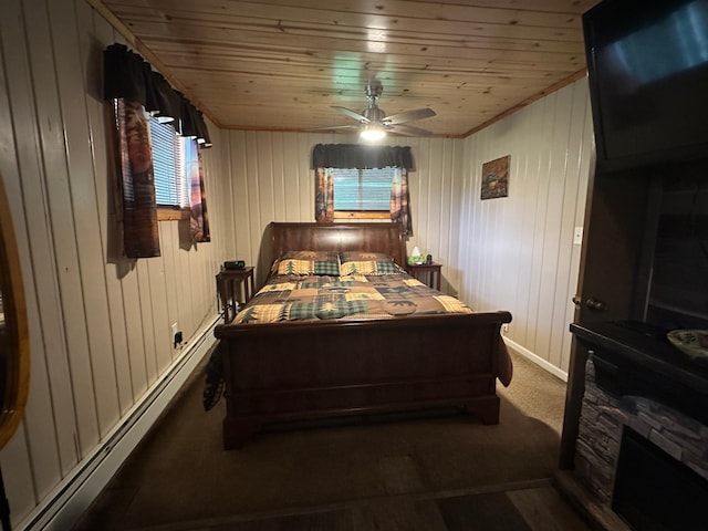 406 State 6 S, Remer, MN 56672 - carpeted bedroom with wooden ceiling, a ceiling fan, and a baseboard heating unit