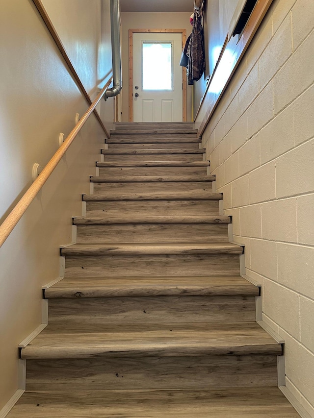 406 State 6 S, Remer, MN 56672 - staircase featuring wood finished floors