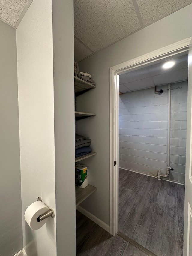 406 State 6 S, Remer, MN 56672 - bathroom featuring wood finished floors and a paneled ceiling