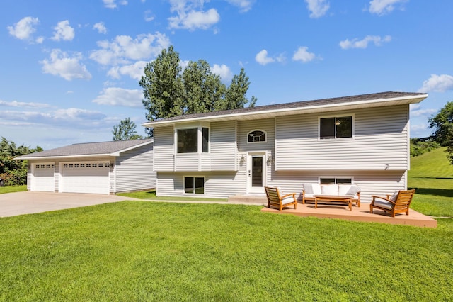 3205 Adair Ave NE, Buffalo, MN 55313 - raised ranch with an outdoor living space, a front lawn, a garage, and driveway