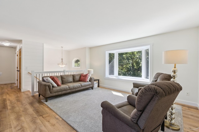 3205 Adair Ave NE, Buffalo, MN 55313 - living area featuring light wood finished floors and baseboards
