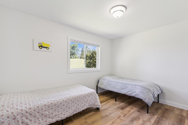 3205 Adair Ave NE, Buffalo, MN 55313 - bedroom with wood finished floors