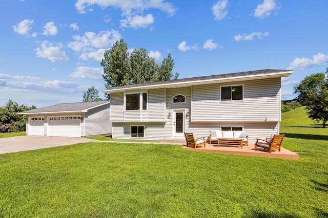3205 Adair Ave NE, Buffalo, MN 55313 - view of front of property with an outdoor living space, a front yard, a garage, and driveway