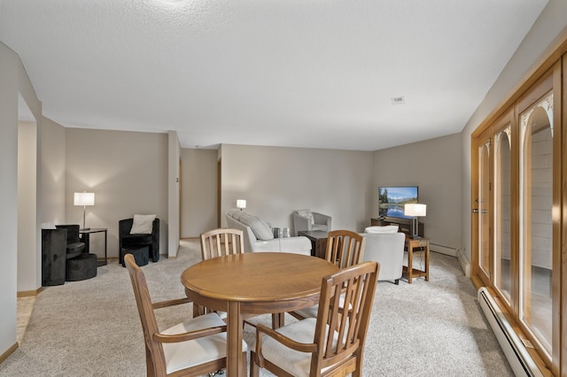 14575 Burma Ave W Unit 205, Rosemount, MN 55068 - dining area with baseboard heating and light carpet