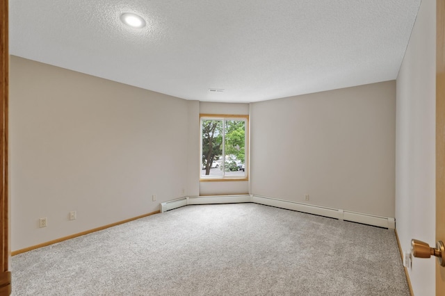 14575 Burma Ave W Unit 205, Rosemount, MN 55068 - empty room with carpet floors, a baseboard radiator, and a textured ceiling