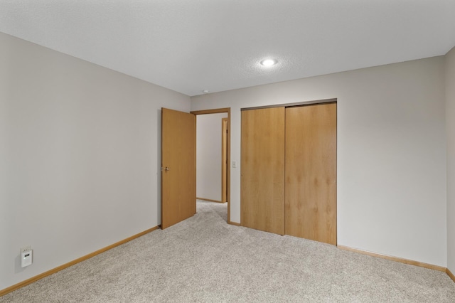 14575 Burma Ave W Unit 205, Rosemount, MN 55068 - unfurnished bedroom featuring light colored carpet and a closet