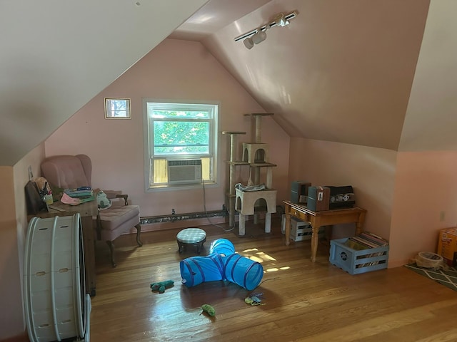 1636 Minnehaha Ave W, Saint Paul, MN 55104 - additional living space with cooling unit, wood-type flooring, and vaulted ceiling