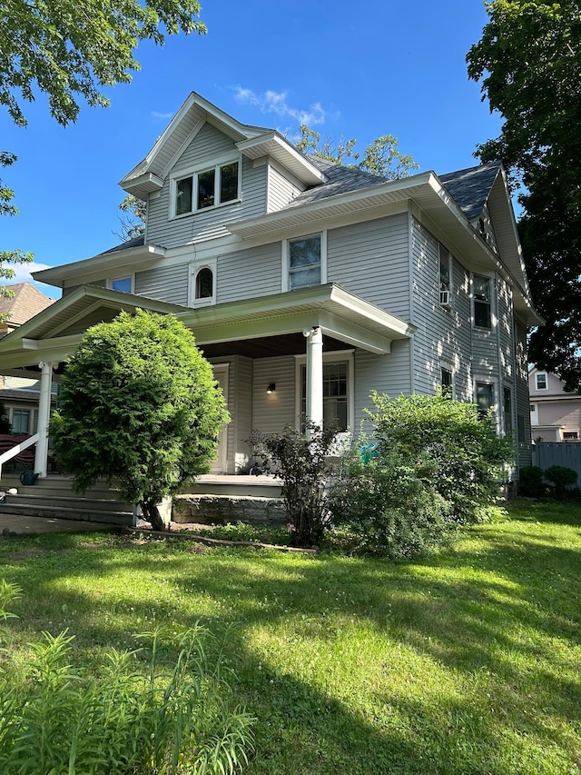 1636 Minnehaha Ave W, Saint Paul, MN 55104 - view of home's exterior featuring a lawn and a porch