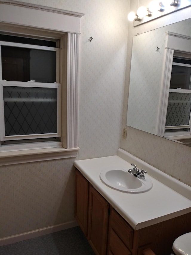 1636 Minnehaha Ave W, Saint Paul, MN 55104 - bathroom featuring vanity and wallpapered walls