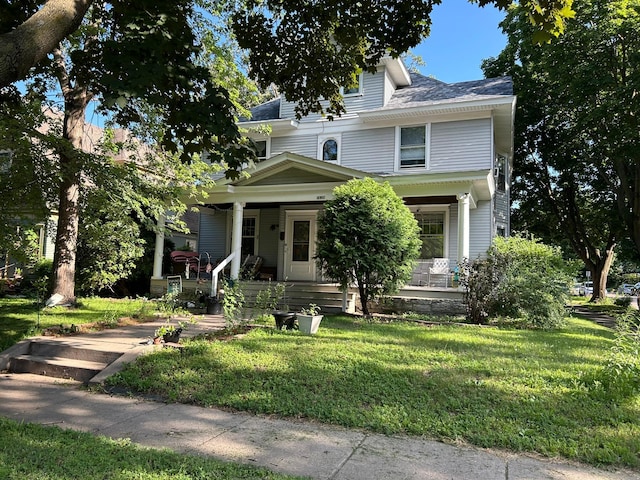 1636 Minnehaha Ave W, Saint Paul, MN 55104 - traditional style home featuring covered porch and a front lawn