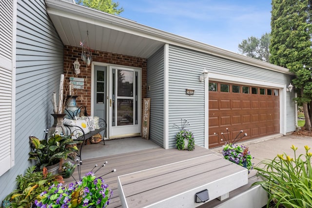 3402 Par St N, Fargo, ND 58102 - wooden deck with a garage and concrete driveway