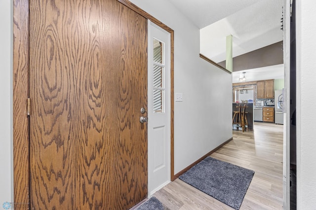 3402 Par St N, Fargo, ND 58102 - foyer entrance featuring light wood-style floors and baseboards