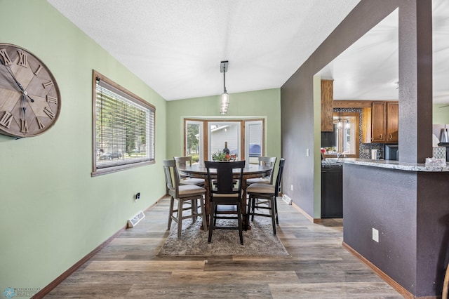 3402 Par St N, Fargo, ND 58102 - dining area with wood finished floors and baseboards