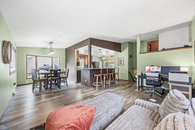 3402 Par St N, Fargo, ND 58102 - living area with dark wood-type flooring and baseboards