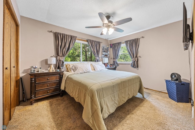 3402 Par St N, Fargo, ND 58102 - carpeted bedroom featuring a textured ceiling and ceiling fan