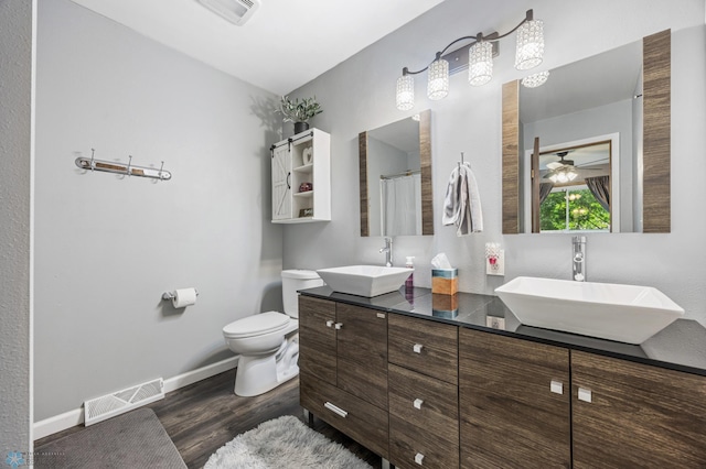 3402 Par St N, Fargo, ND 58102 - bathroom with wood finished floors and double vanity
