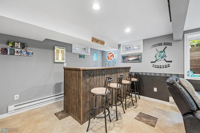 3402 Par St N, Fargo, ND 58102 - indoor dry bar with a baseboard radiator and recessed lighting
