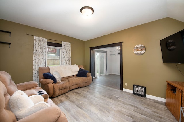 517 Elm St, Mankato, MN 56001 - living room featuring lofted ceiling and light wood-type flooring