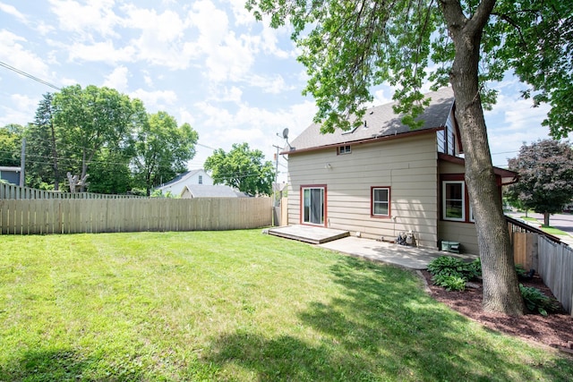 517 Elm St, Mankato, MN 56001 - rear view of house with a patio and a fenced backyard