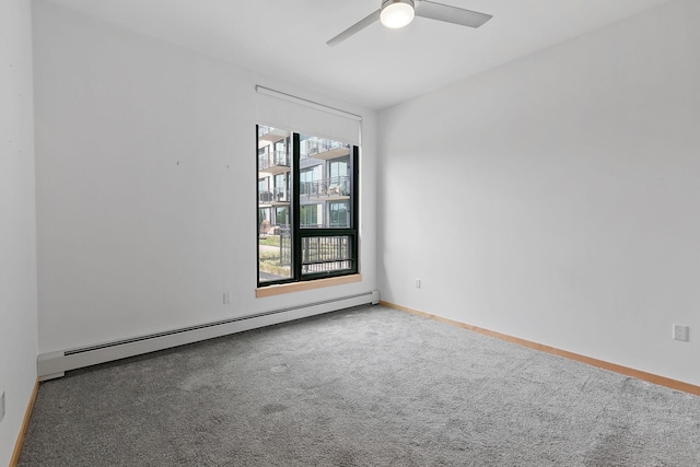 1240 2nd St Unit 225, Minneapolis, MN 55415 - unfurnished room with baseboard heating, carpet flooring, and ceiling fan