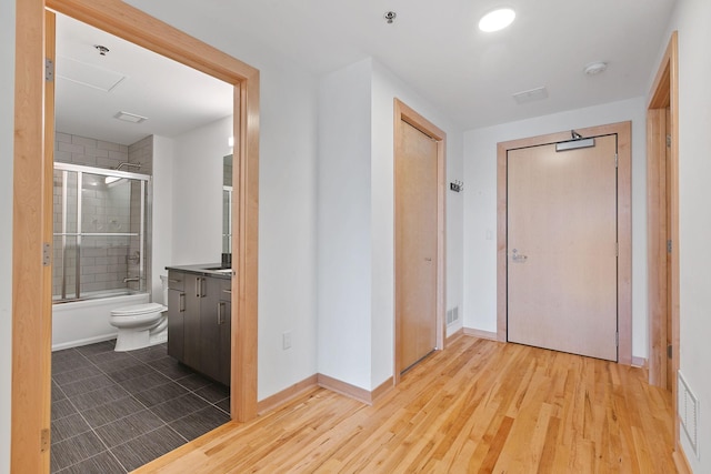 1240 2nd St Unit 225, Minneapolis, MN 55415 - hallway with wood finished floors