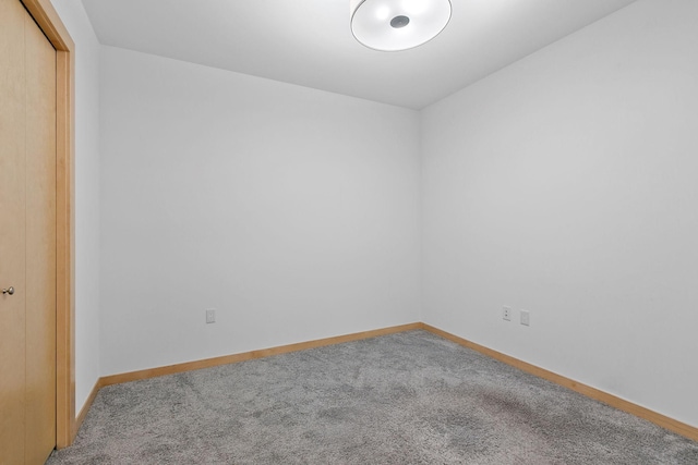 1240 2nd St Unit 225, Minneapolis, MN 55415 - empty room featuring carpet flooring and baseboards
