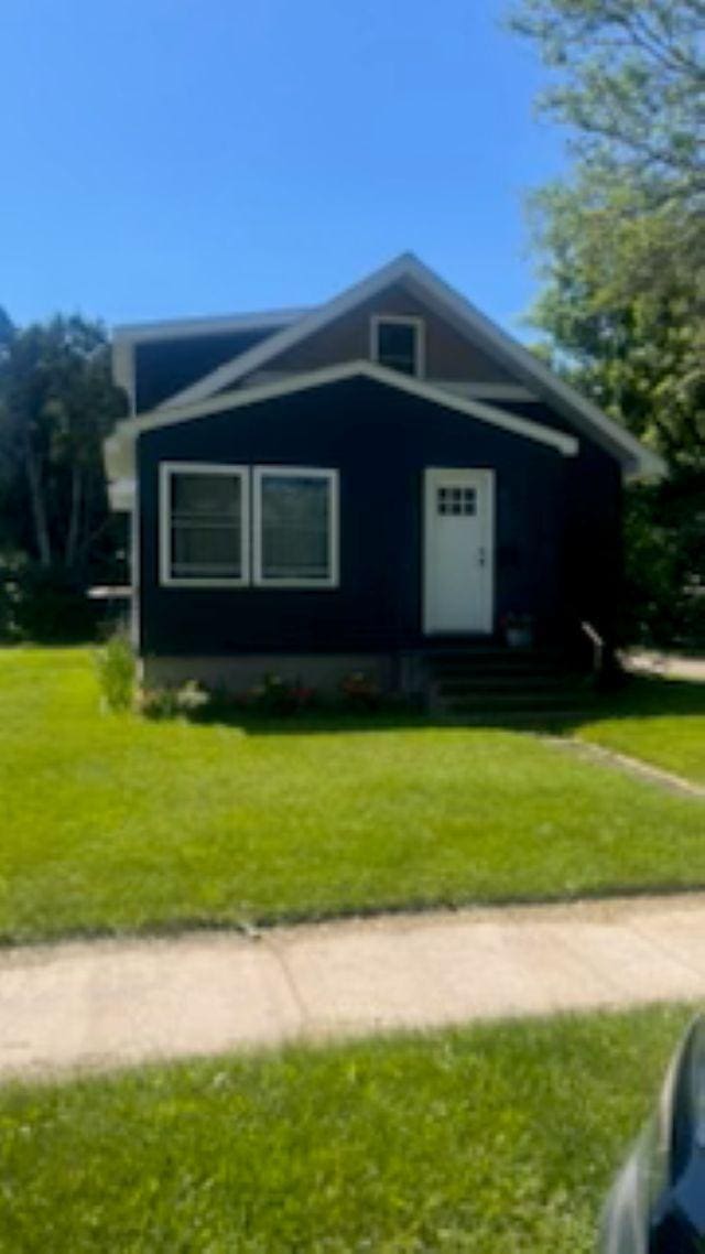 421 8th St, Cloquet, MN 55720 - view of front of property with a front lawn