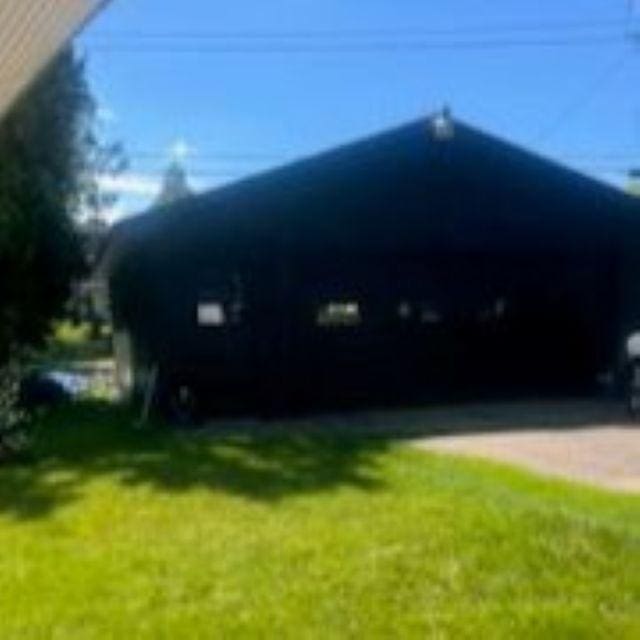 421 8th St, Cloquet, MN 55720 - view of property exterior featuring a yard