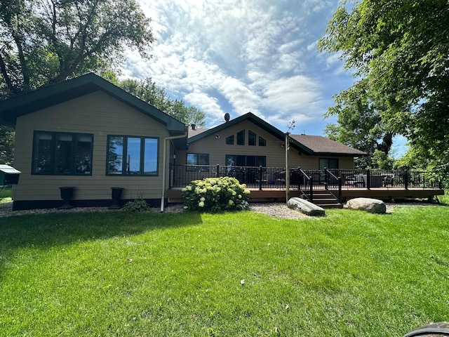7443 Walleye Ln SW, Alexandria, MN 56308 - rear view of property featuring a wooden deck and a lawn