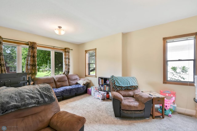 51 6th Ave N, Fargo, ND 58102 - carpeted living area with baseboards