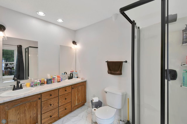 51 6th Ave N, Fargo, ND 58102 - bathroom with a shower stall, double vanity, marble finish floors, and recessed lighting