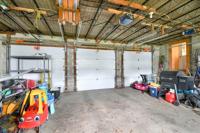 51 6th Ave N, Fargo, ND 58102 - garage featuring a garage door opener