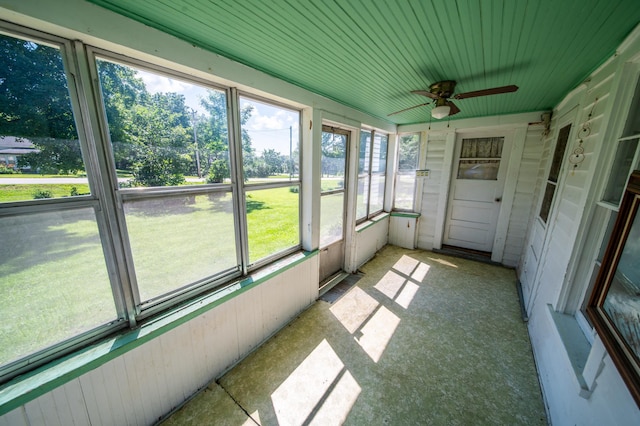 415 Minnesota Ave S, Oronoco, MN 55960 - unfurnished sunroom with a ceiling fan and plenty of natural light