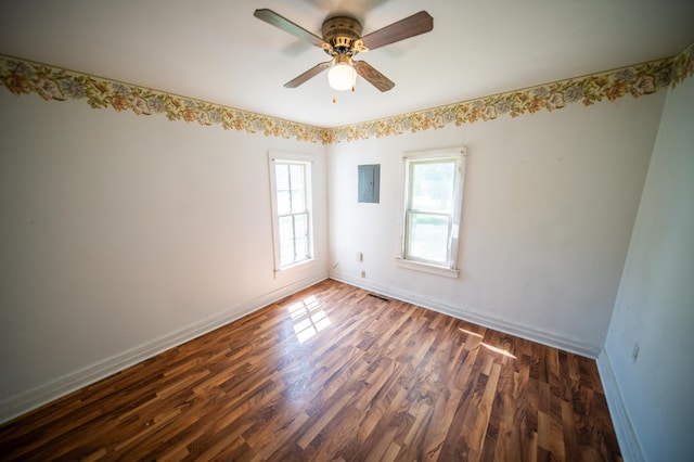 415 Minnesota Ave S, Oronoco, MN 55960 - spare room featuring wood finished floors, ceiling fan, and electric panel